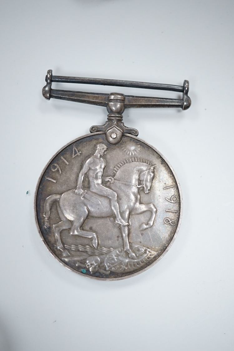 A cased WWI compass, an RG watch and a medal awarded to 33486 PTE. N. FRANCE. LING. R.